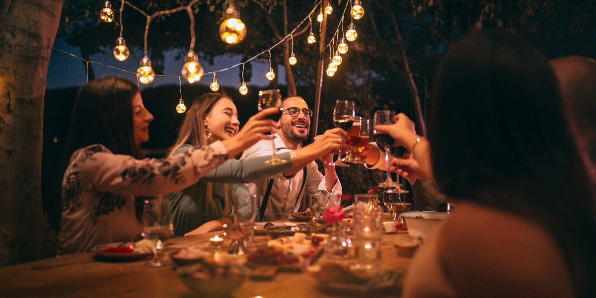 Group-of-friends-toasting-at-a-holiday-party